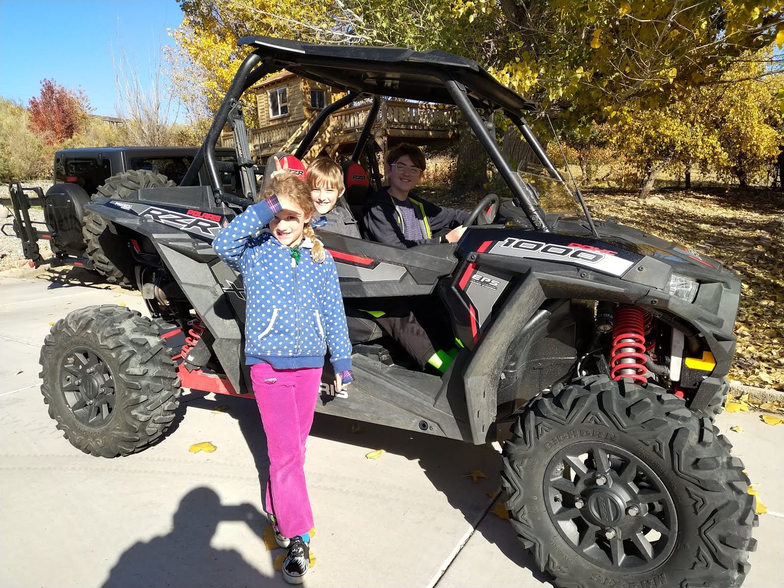 Riding Around With Grandpa in the Yard