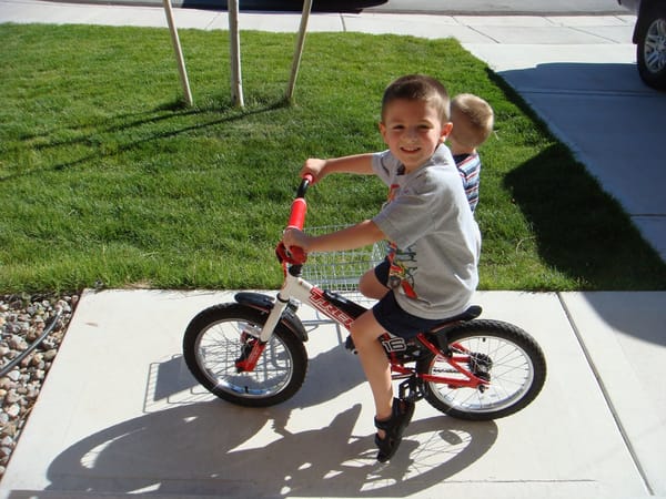 Carson rides with no training wheels!