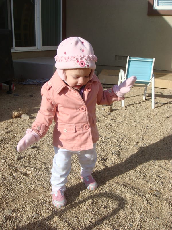 Cutie pink girl in the backyard